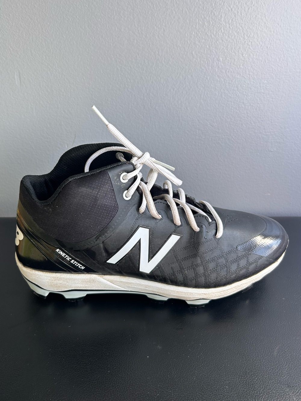 New Balance Men’s Black and White Athletic Cleats